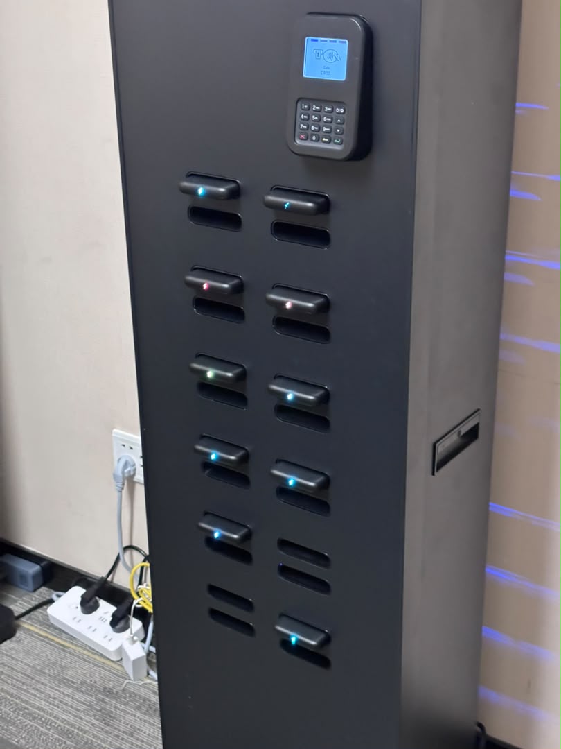 Close-up of the charging station’s payment terminal and docked portable power banks